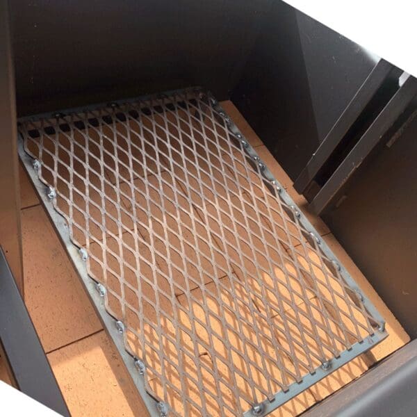 Custom charcoal grate by JD Fabrications grills.
