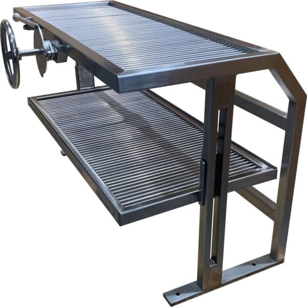 Stainless grill with front wheel crank and height adjustable Argentine grate