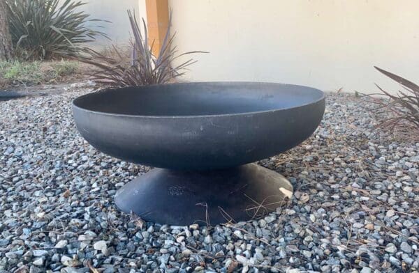 Backyard bon fire pit. Made with steel tank heads.