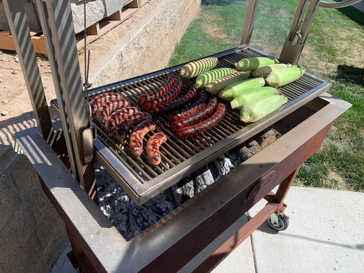 Gaucho-Grill-Cooking-Up-sausage__38304.1660177163.1280.1280