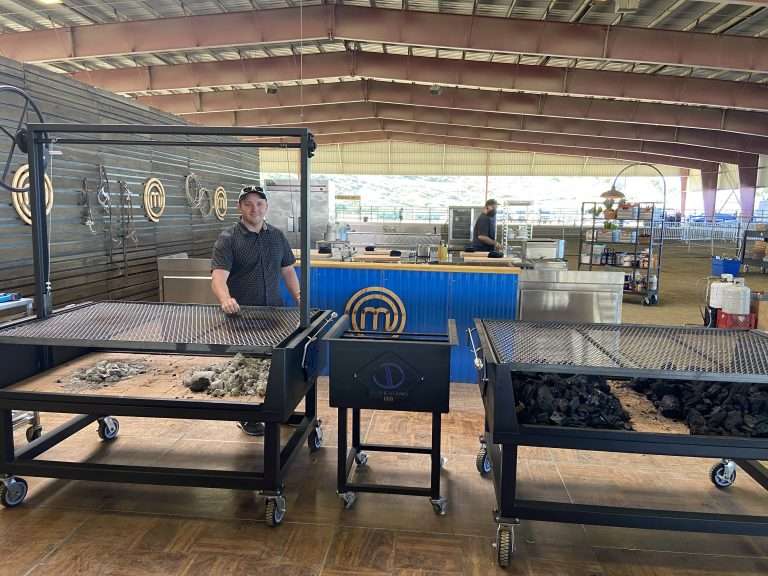 JD Standing Infront of Argentine BBQ Grills prior to Master Chef show