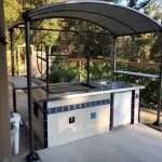 Santa Maria grill with custom rooftop cover.