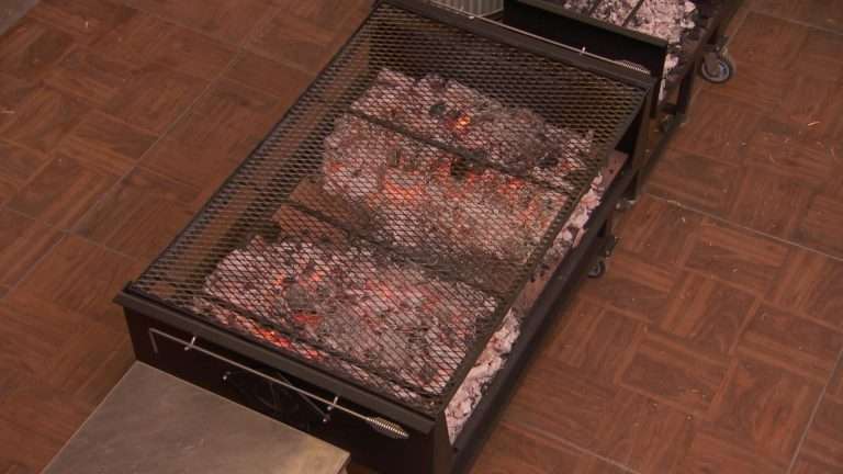 Master Chef Charcoal Grill lit and ready to air
