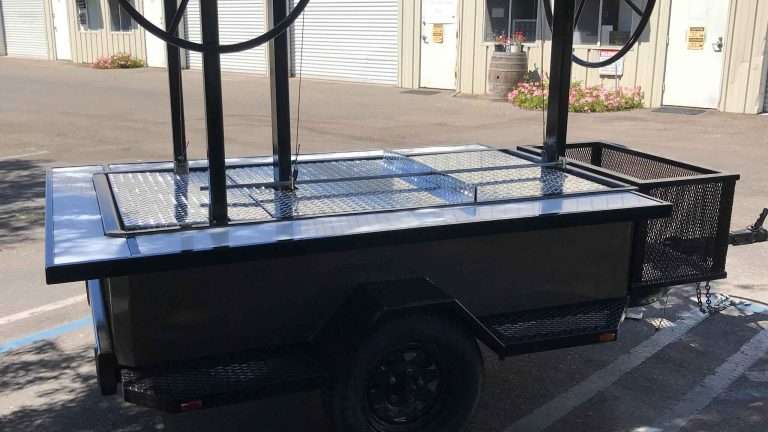 Santa-Maria-Trailer-Grill-With-wrap-around-cutting-boards-and-lids