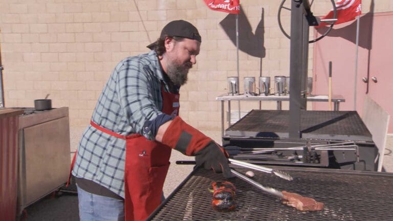 master chef cooking prok on santa maria grill